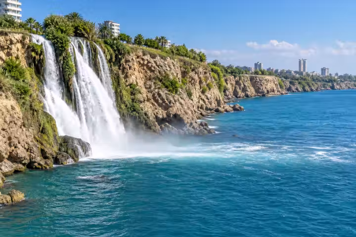 Lower Duden waterfall flowing over Antalya’s cliffs into the Mediterranean