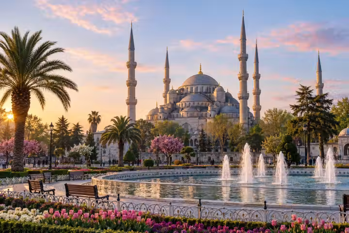 Blue Mosque and Sultanahmet fountain in warm morning light in Istanbul