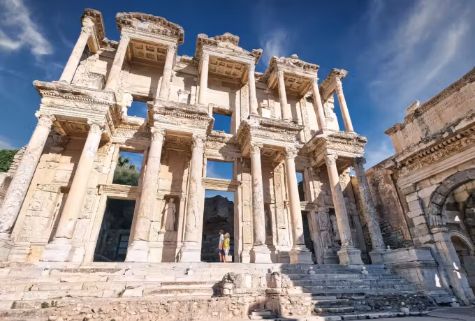 Looking up from the paving at the two tiers of Corinthian orders on the Celsus front, Ephesus