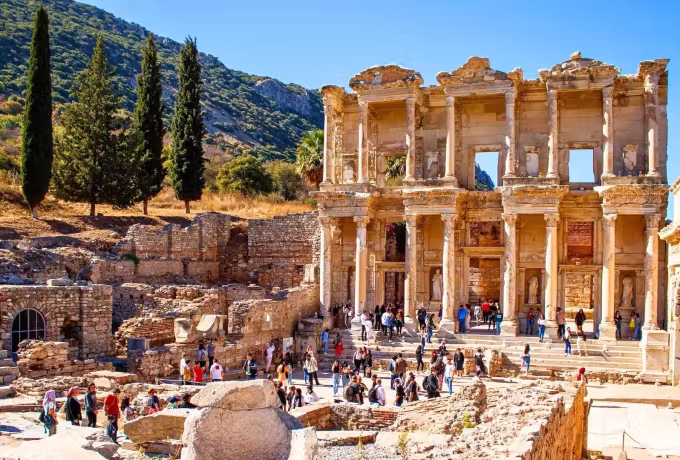 Court below the Celsus front full on a clear October day under a cypress-covered slope, Ephesus