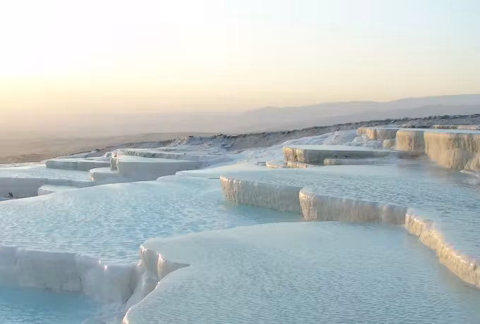 White travertine terraces and shallow pools at Pamukkale
