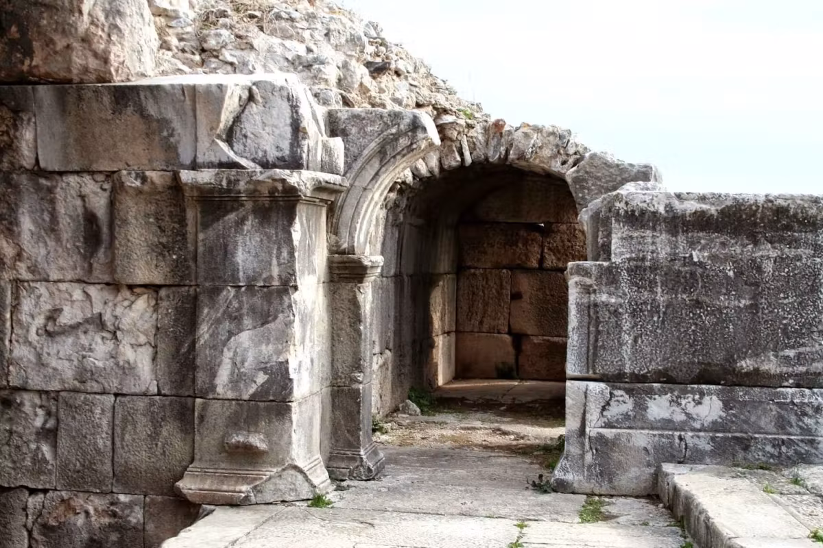 Heavy masonry at Miletus pierced by a single worked opening with a rounded head