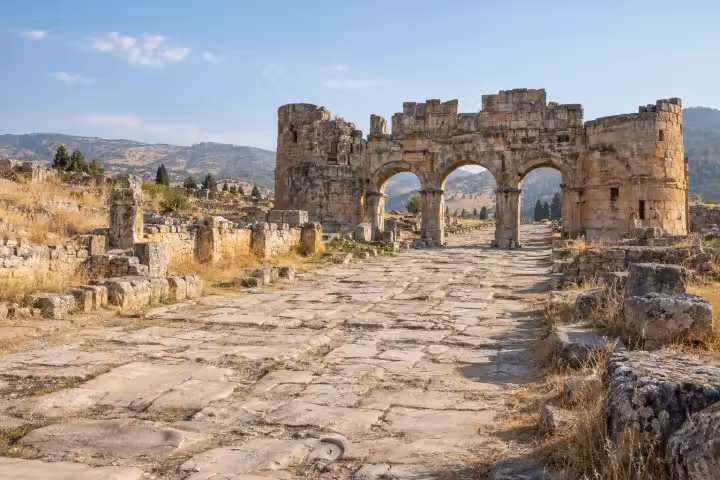 Ancient stone gateway and paved street at Hierapolis near Pamukkale